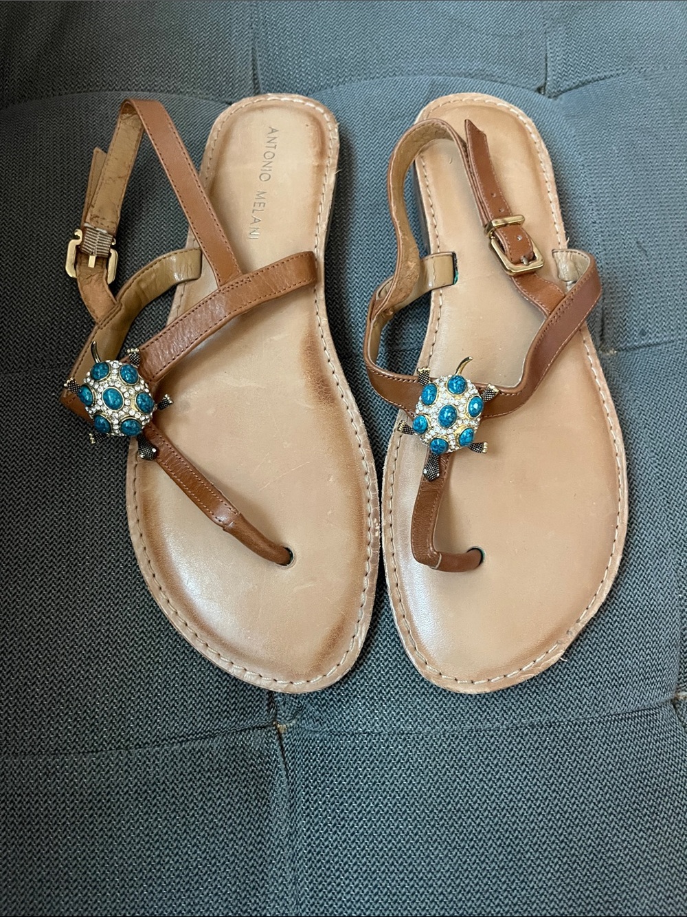 ANTONIO MELANI Brown Leather T‑Strap Sandals with Blue Turtle Gem Accents